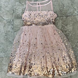 Light pink short dress with gold sequins.